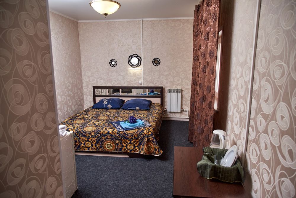 Просторный гостиничный номер в Барнауле на 4, 5 и 6 гостей - фотография